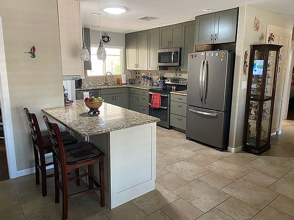 4th image of 10319 W Charter Oak Dr
