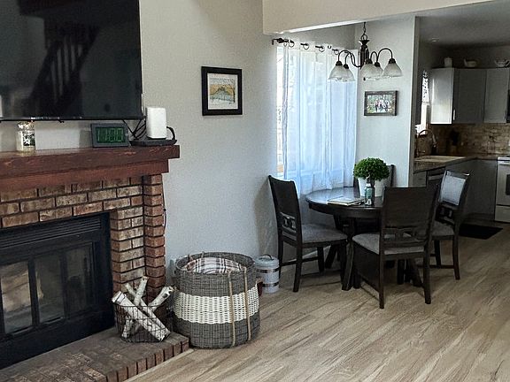 Living room looking into eat in kitchen.
