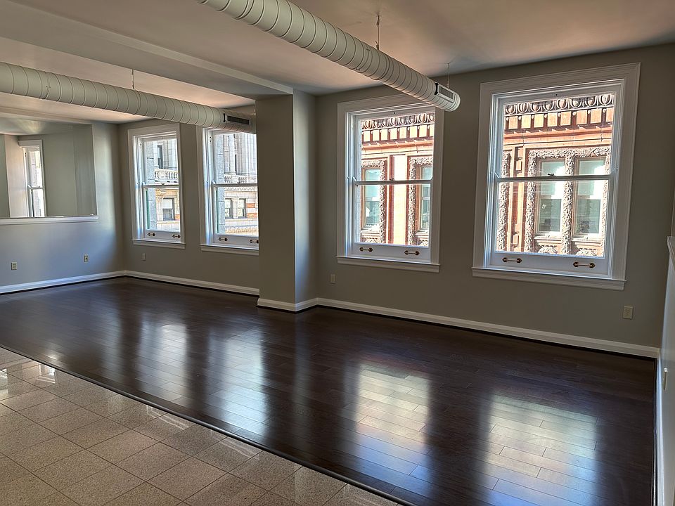 Living Room with granite and wood floors.