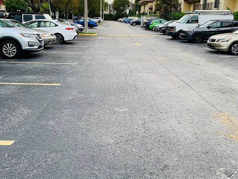 Condominium, Gated Parking Lot.
