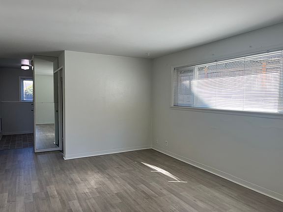 Your living room in natural daylight with brand new flooring