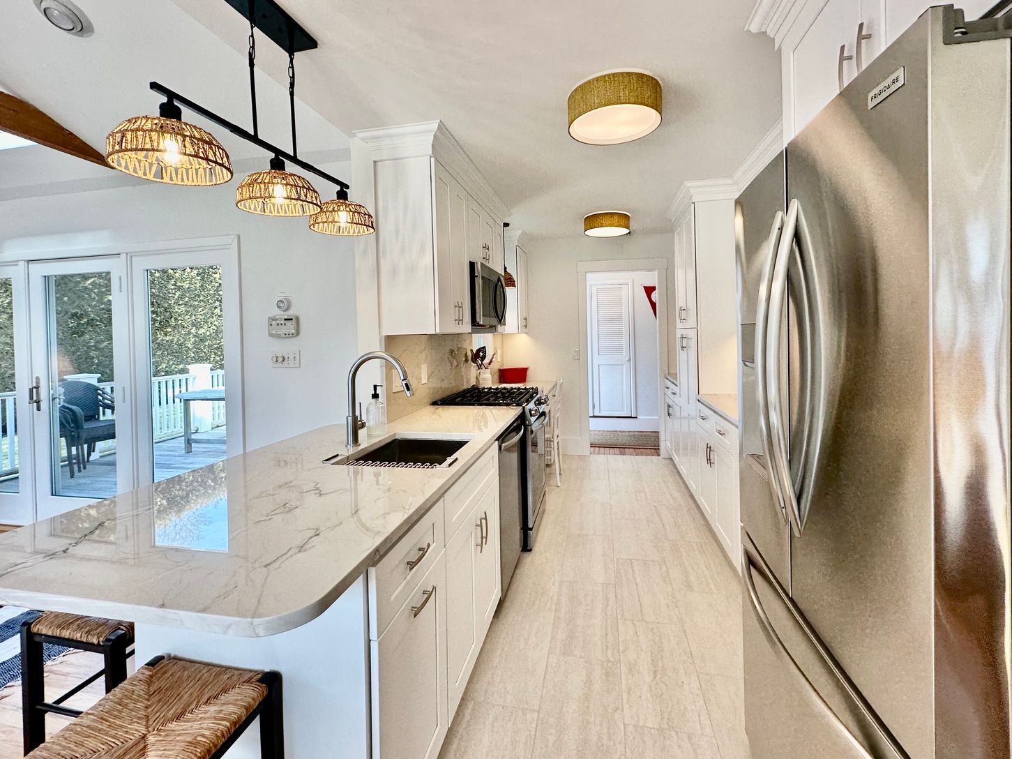  Well Appointed Galley Kitchen with Expansive Storage and Full Hallway Pantry
