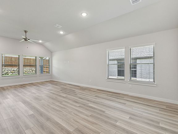 Dining room in the Quartz home plan by Trophy Signature Homes - REPRESENTATIVE PHOTO