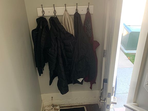 coat rack behind entry door