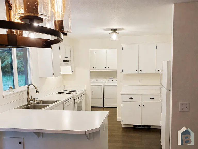 Kitchen with plenty of storage. New countertops being installed soon :)
