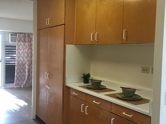 Kitchen Counter, Cabinet Storage, Peek at Bedroom