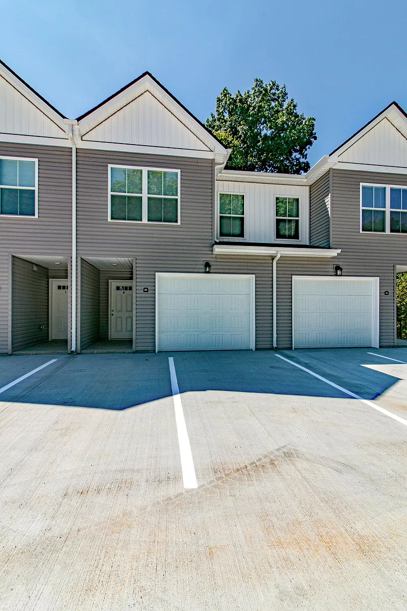 Front of Condo with Private Entrance and 1 Car Garage with 2 parking spaces in front of entry. - 1960 Batts Ln
