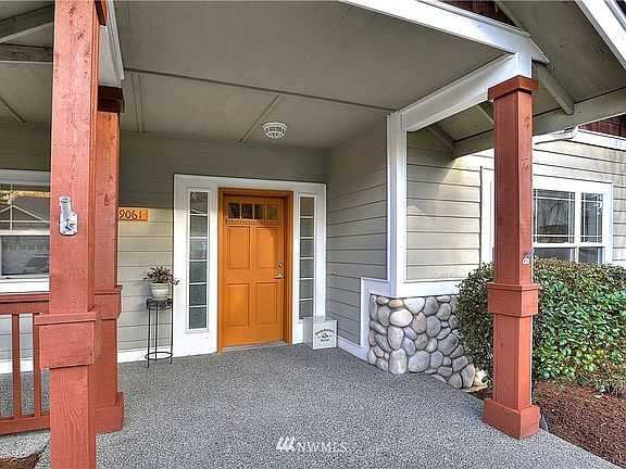 Welcome to wonderful 9061 Eagle Point Loop Rd SW in the gated community of Eagle Point at American Lake. Come on in!