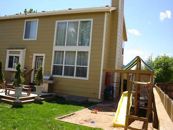 Southward view of sandbox and patio