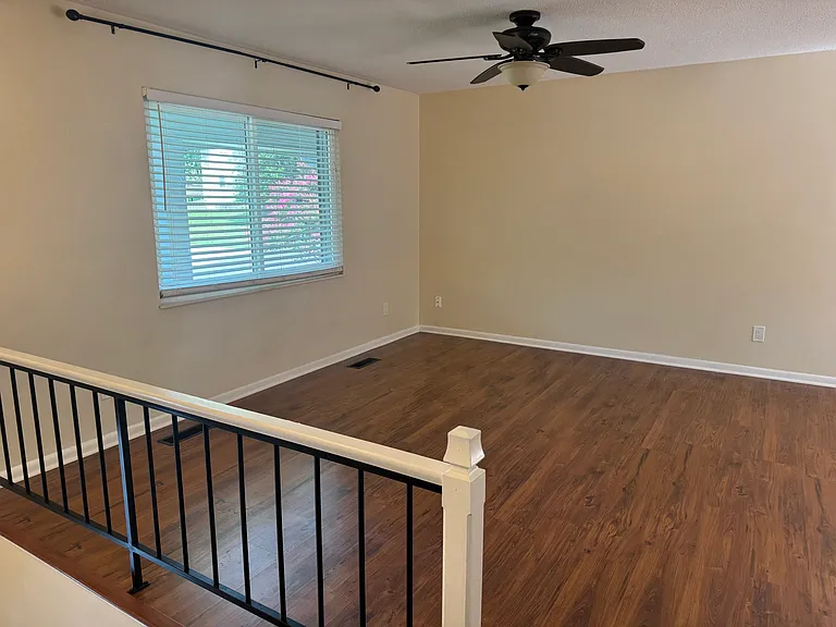 Living room - solid surface flooring