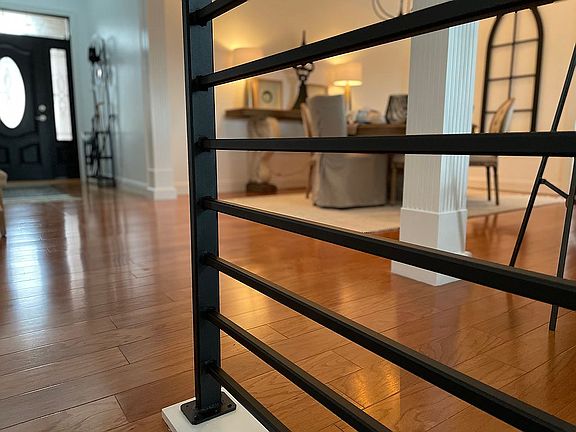 Stunning black iron rail