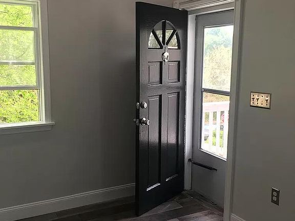 Entry door to living room.