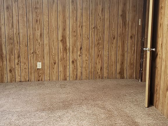 First of 4 bedrooms. All 4 bedrooms are similar in size, carpet, and walls.