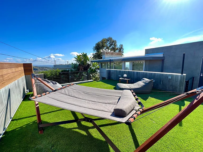 Zen Garden & Elevated Grass Sundeck for Relaxation