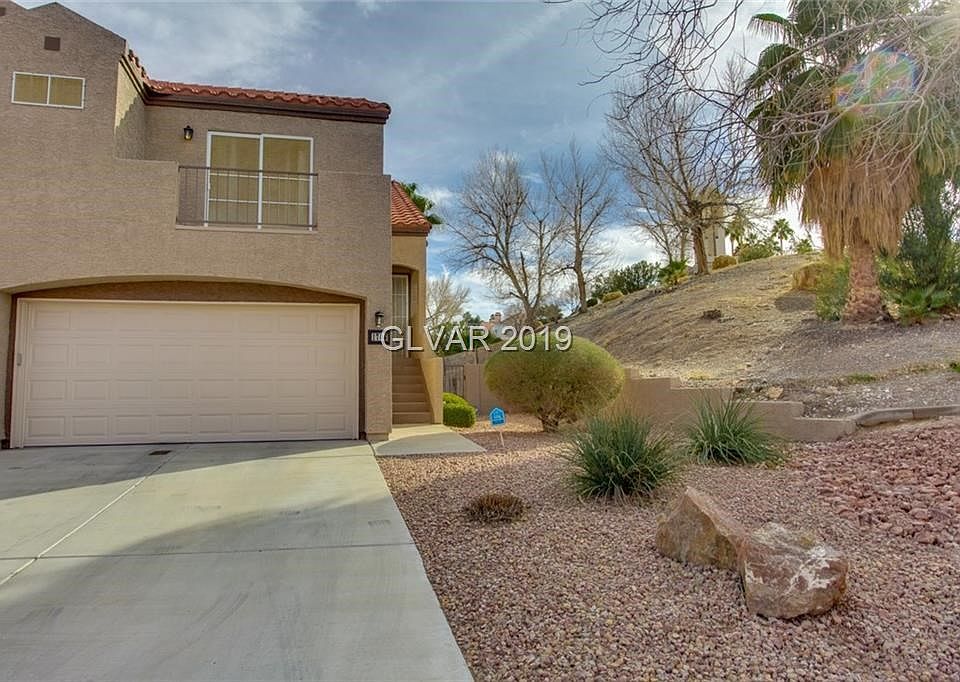 Exterior Front features desert landscaping with double deep driveway.