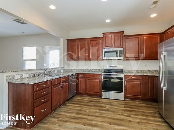 5th image of 9205 Magnolia Lily Ave
