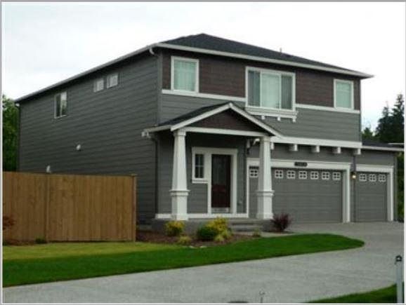 Front entrance, three car garage.