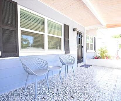 Screened, tiled front porch