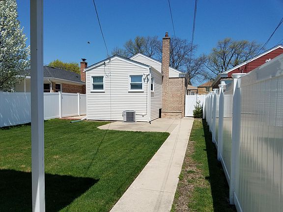 Backyard surrounded by privacy fence