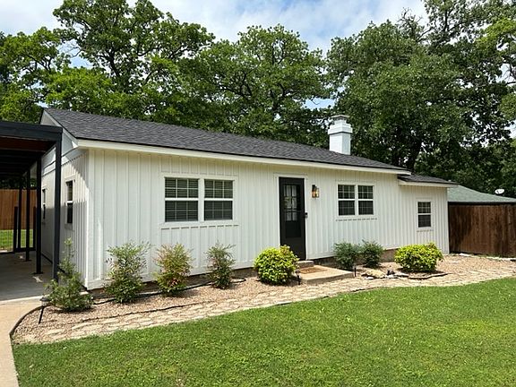 Cute, cozy cottage on double lot; centrally located; covered carport for up to 2 vehicles.