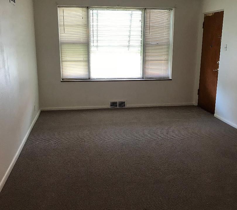 Living Room Beige carpet throughout