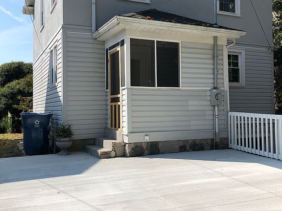 Back entrance & parking pad