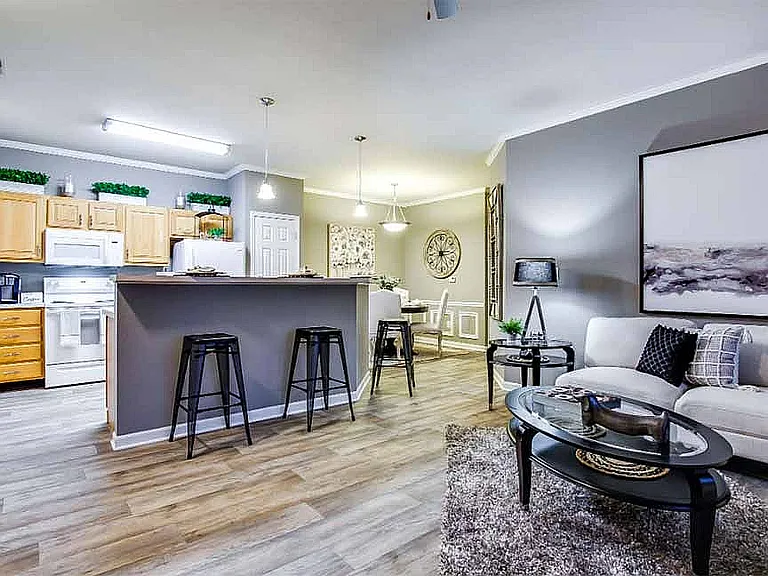 Most floor plans are open-concept with large kitchen islands and breakfast bars.
