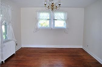 Spacious dining room with chandelier