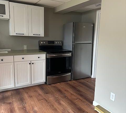 Stainless steel stove and refrigerator recently installed.