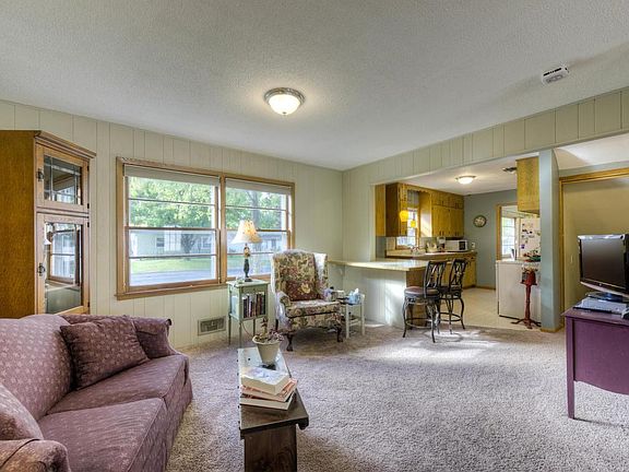 You will love the open main floor family room located right off the kitchen complete with a breakfast bar.