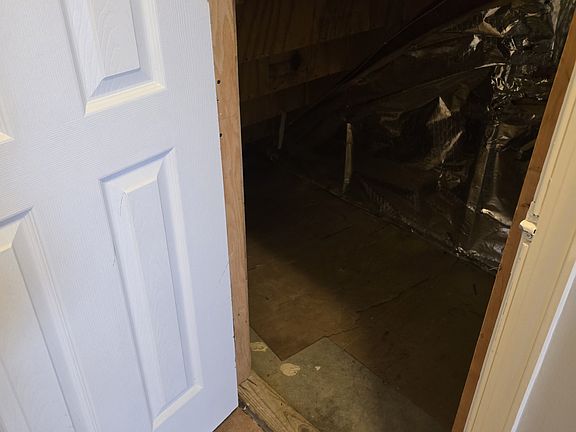 STORAGE SPACE UNDERNEATH STAIR CASE