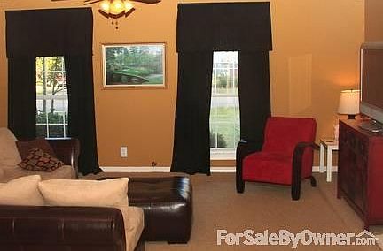 Enclosed garage - bonus living area : updated ceiling fans, carpet less than 3 years old, spacious