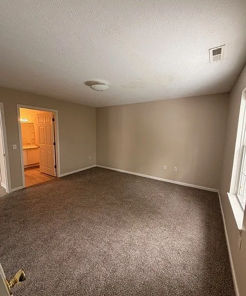 Bedroom 1 with attached bath.