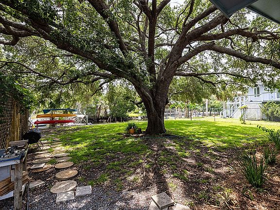 shaded backyard on canal