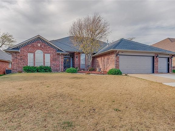 Big windows. Freshly painted garage doors.