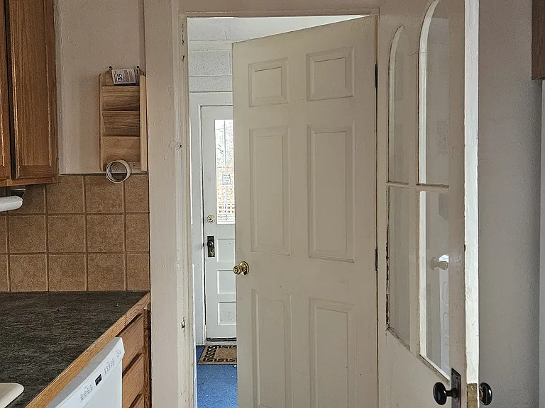 Kitchen & exit to laundry and backyard