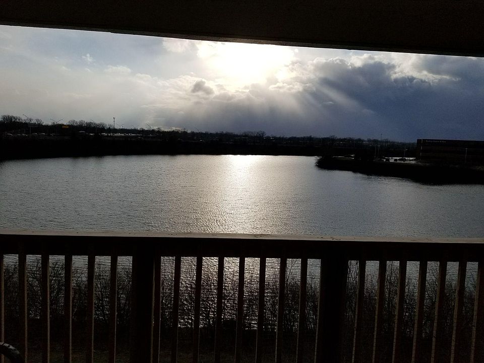 Sunset lake view from balcony (all windows and sliding doors