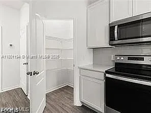 209 SE 26th Terrace Cpe — Photo 18