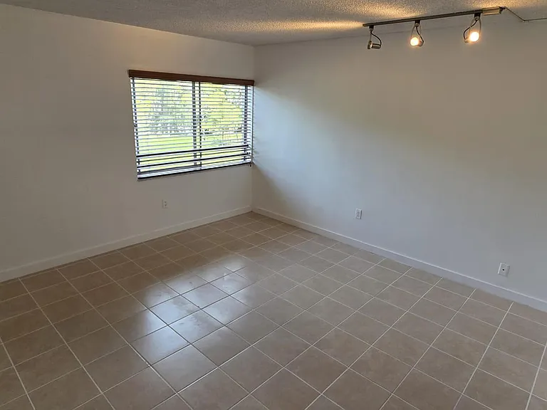 711 N Pine Island Rd #210 — Photo 12