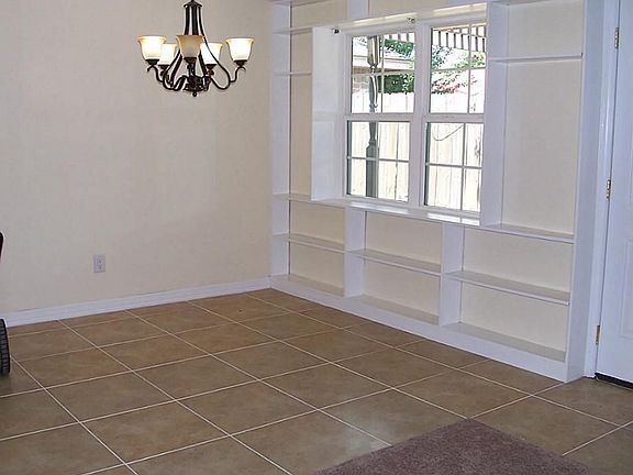 BREAKFAST AREA OR DINING ROOM WITH TILE FLOORING