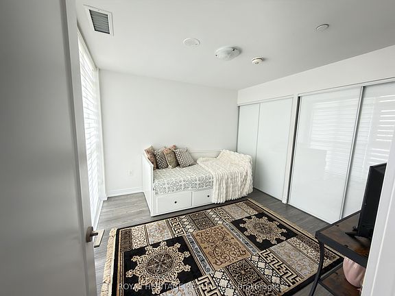 4th image of 225 Village Green Sq E #409