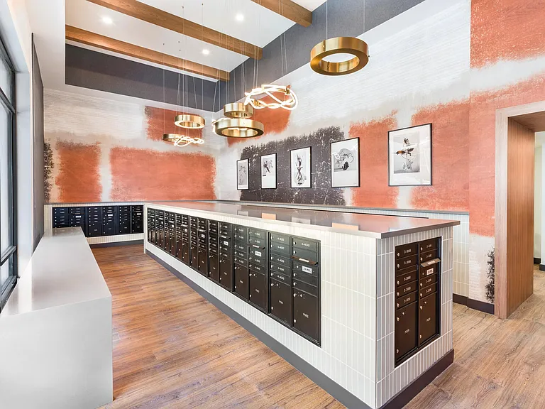 Sleek mailroom design meets modern convenience at Modera Higley Commons_your daily deliveries handled with ease just moments from home.
