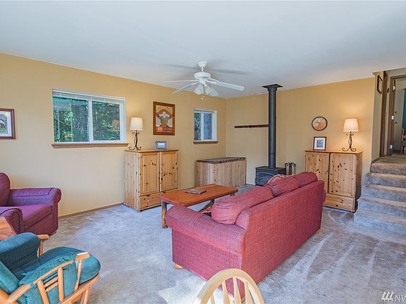 Upper level living space. The stairs step up to the 2 bdrms & full bath.