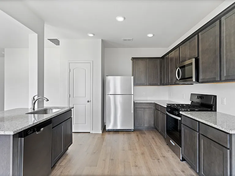 The kitchen has energy efficient appliances.