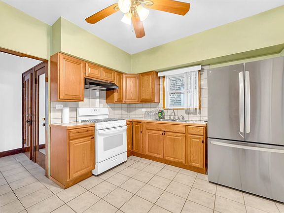 5th image of 4314 N Menard Ave