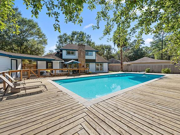 Extensive decking on an oversized lot, perfect for entertaining family and friends.