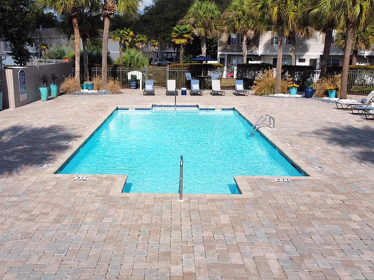 Jump into our sparkling swimming pool, a perpetual sanctuary of sunshine.
