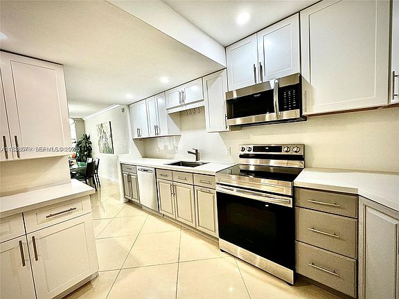 5th image of 1080 94th St APT 212