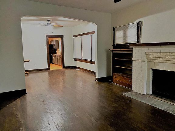 Living room with view to dining and kitchen