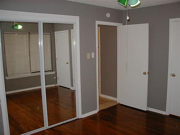 Master with 1/2 bath, Mirrored Closet, walk-in closet (not shown).